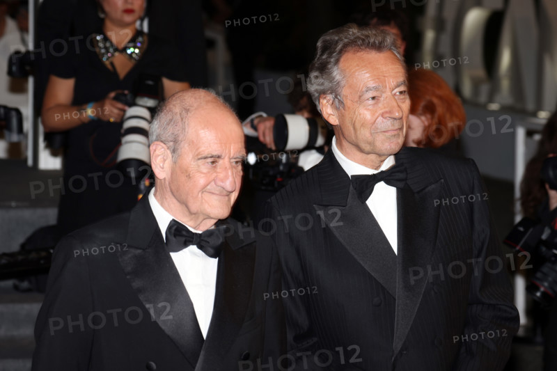 Michel Denisot and Pierre Lescure attend the "Coward" screening during the 79th annual Cannes Film Festival at Palais des Festivals on May 21, 2026 in Cannes, France.