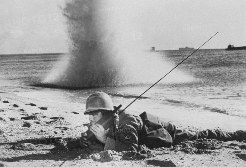 American soldier with SCR-536 Handie-Talkie (portable telephone),1944.