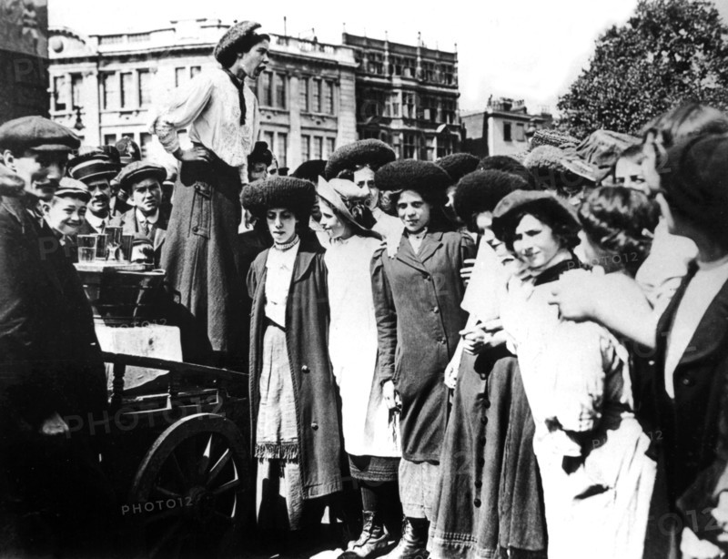 British worker addressing her workmates