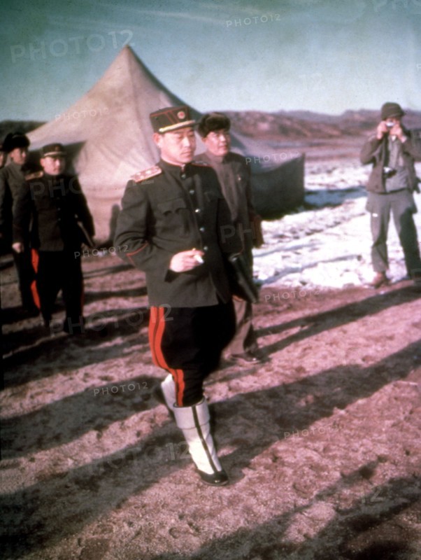 General Namii, North Korean delegate, in the foreground, and General Pien Chang Wu leaving the Panmunjom conference, 1951