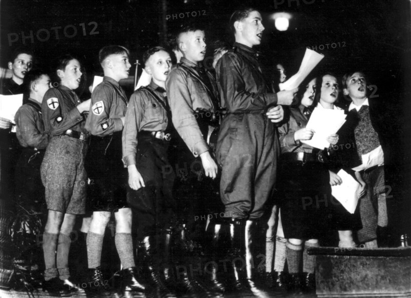 Berlin. Young Hitlerians in uniform, singing in praise of Hitler during a music festival at the "Kroll Oper"