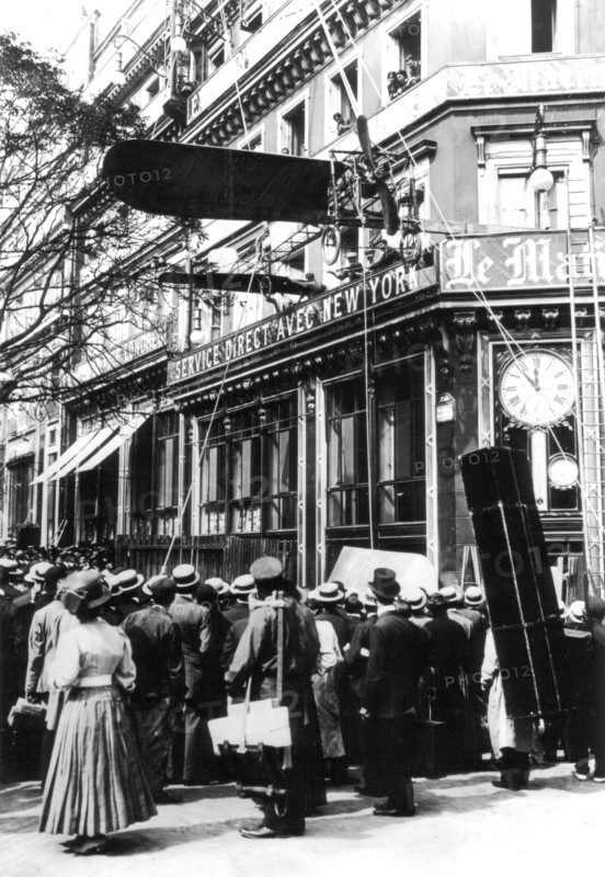 Paris. Model of Blériot's aeroplane on exhibition in front of the offices of the newspaper "Le Matin"