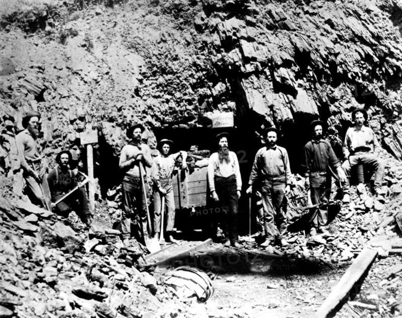 Miners before the entry of a mine in the Montana