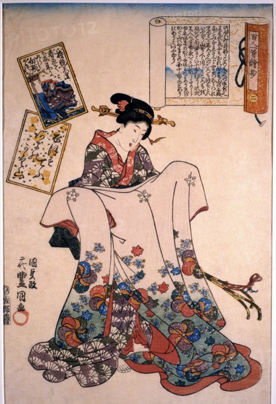 Kunisada, Woman holding and displaying lavish dress
