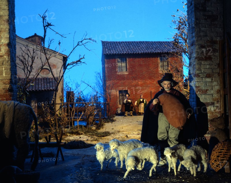 Nativity scene: Shepherd with flock of sheep