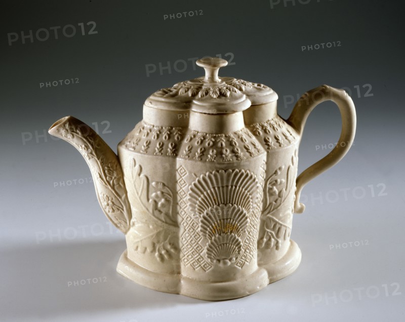 White teapot with oriental style decoration