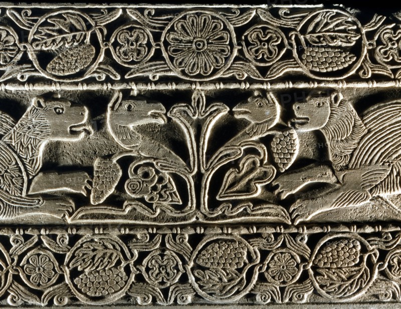 Animals facing each other around the tree of life (detail)