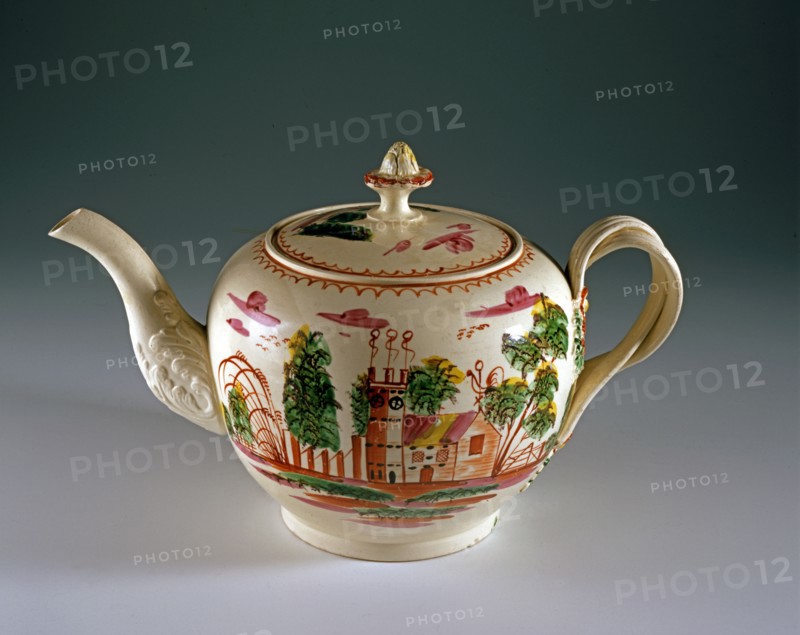 Teapot with painted landscape design