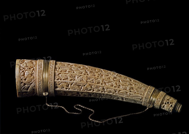 Ivory horn with decorated with animal imagery