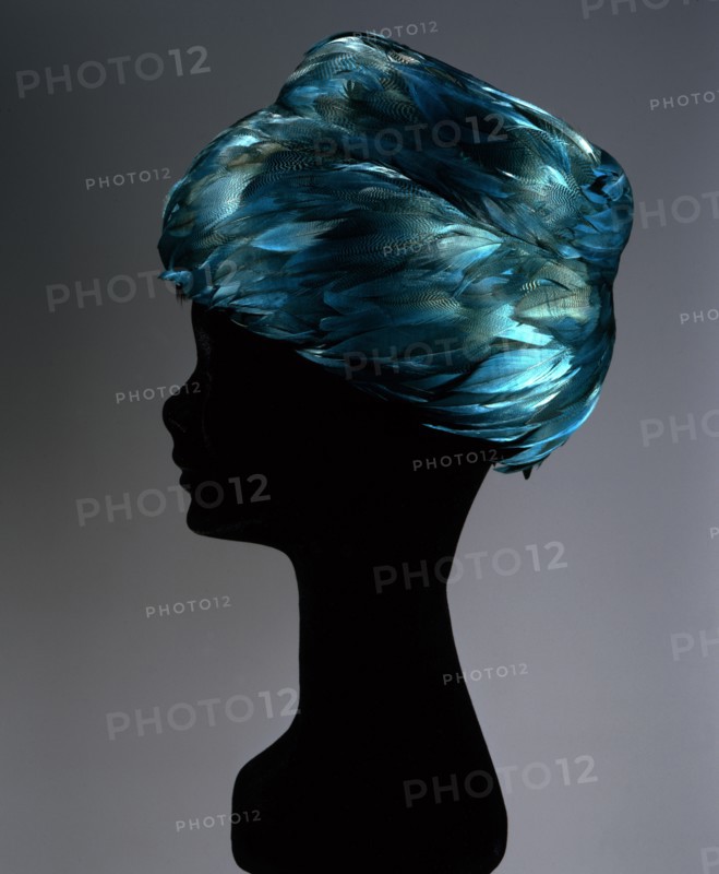Rooster feather cloche hat in several shades of green