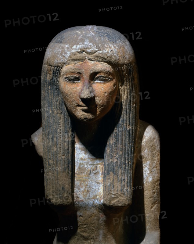 Bust of female statue made of painted sandstone