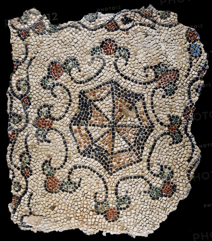 Mosaic fragment with stylized flower decoration