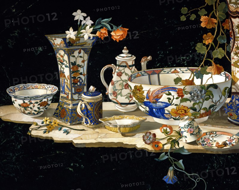 Table top in marquetry of hard stones decorated with a composition of porcelain and flower vases