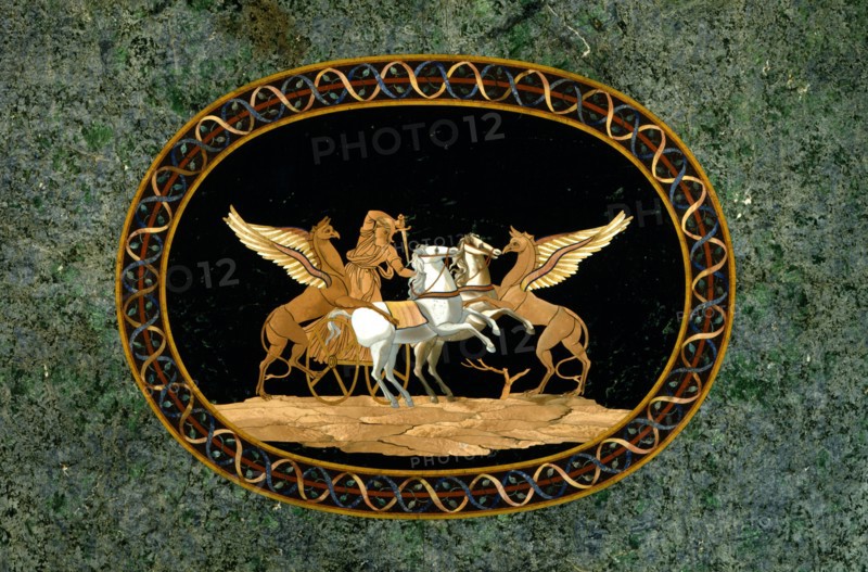 Table top in marquetry of hard stones, decorated with a warrior on his chariot fighting against two chimeras