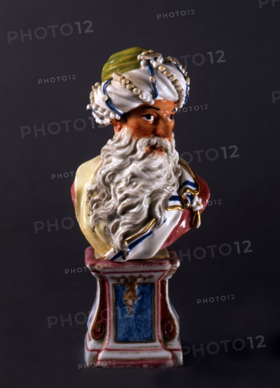 Bust of an old oriental man, on a pedestal