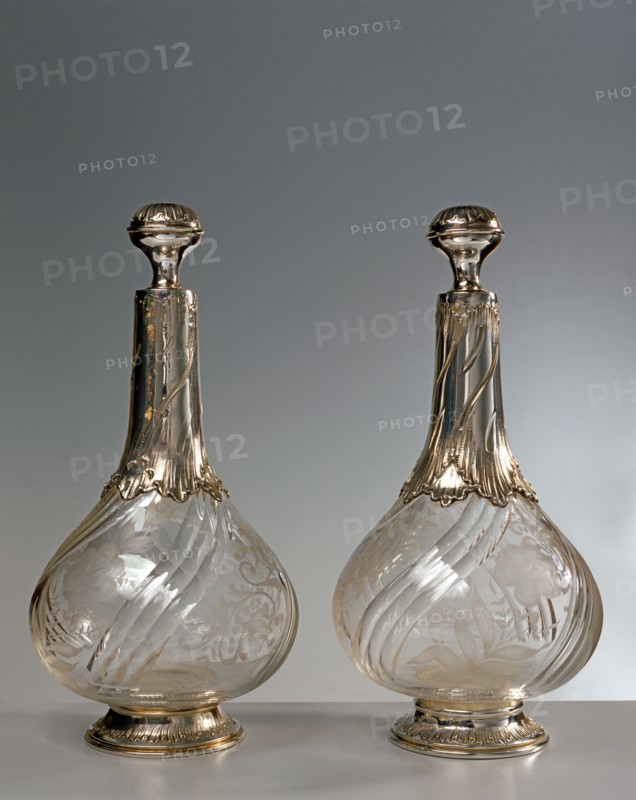 Two bottles in engraved crystal