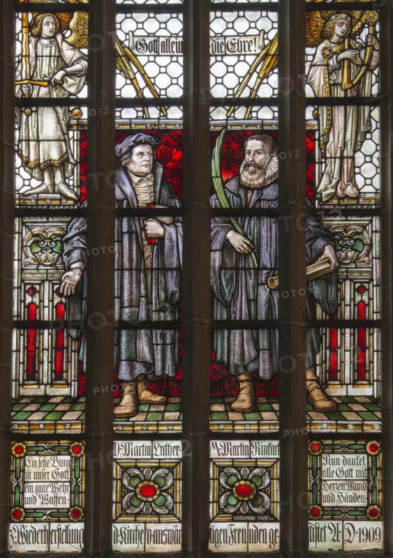 Martin Luther and Martin Rinckart. Stained glass window of the church of Sainte-Anne in Eisleben