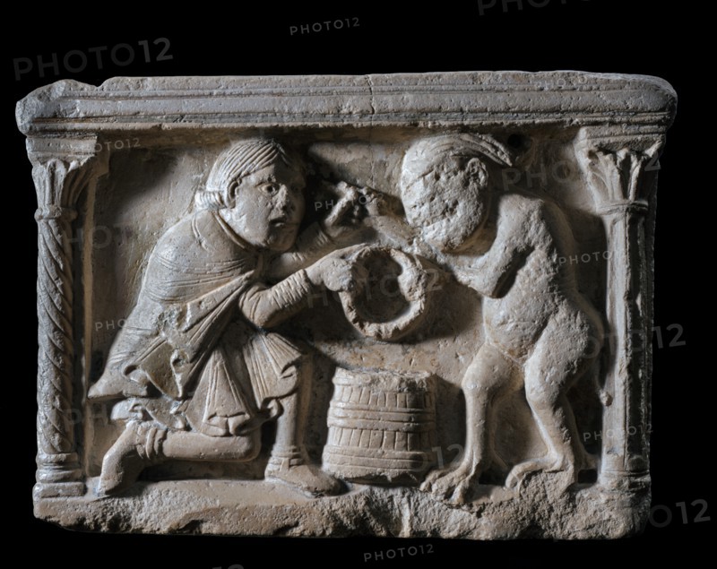 Marble stoup representing the legend of the 'Pact between the Knight and the Devil'
