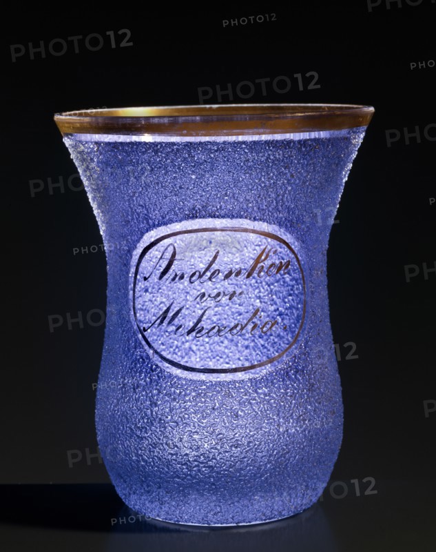 Clear glass souvenir glass with blue glass bead applications (Glasperlen)