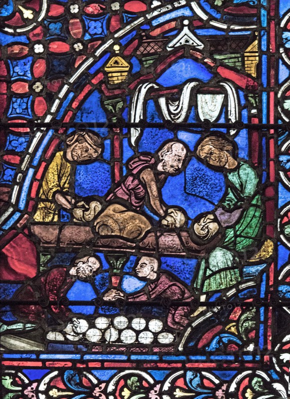 Les boulangers façonnent les boules de pain (vitrail de Chartres)
