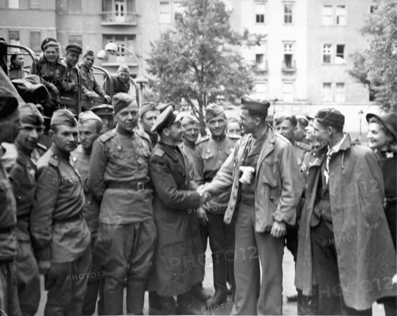 U.S sergeant receives a Russian welcome in Berlin, Germany (July 2,1945)