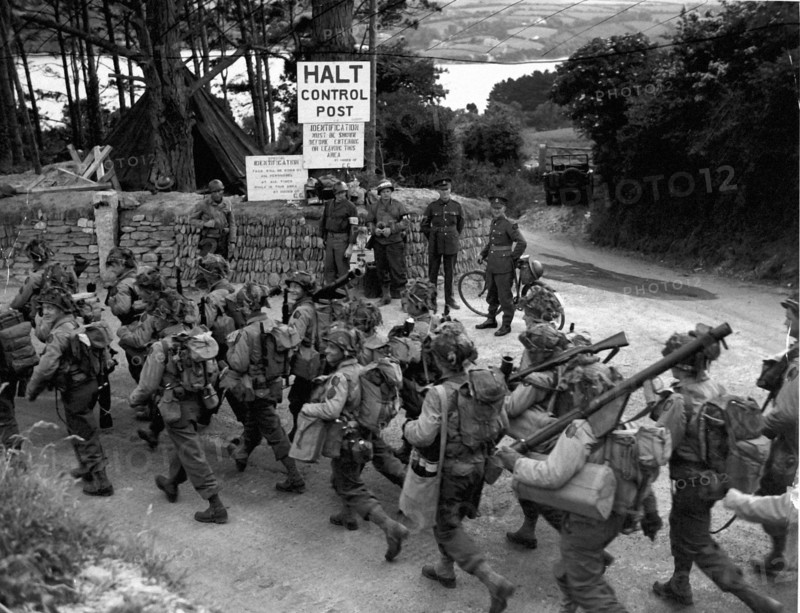GI's and their equipment on their way to the landing crafts (England-June 3,1944)