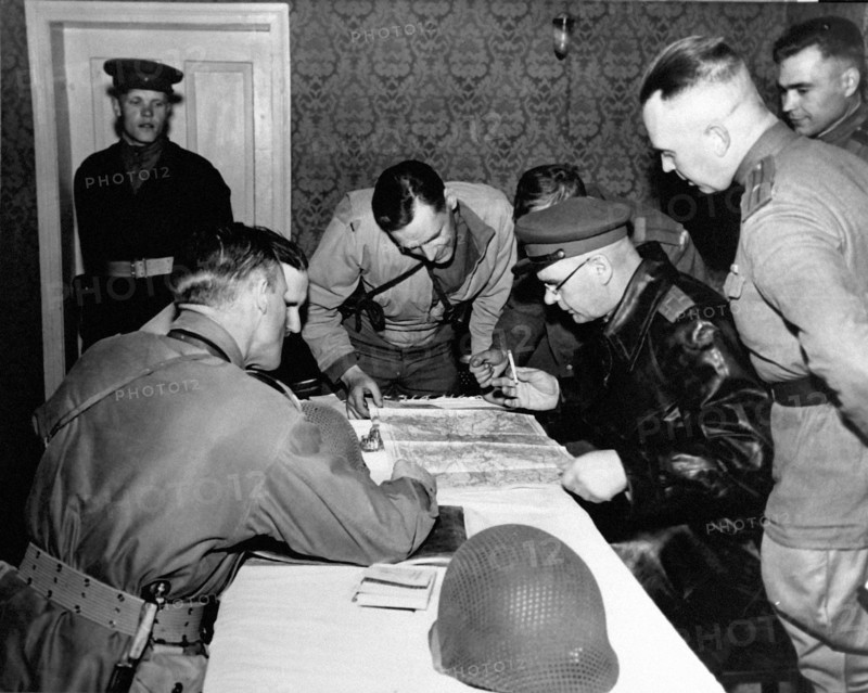 Russian and American officers confer after linkup (April 28,1945)