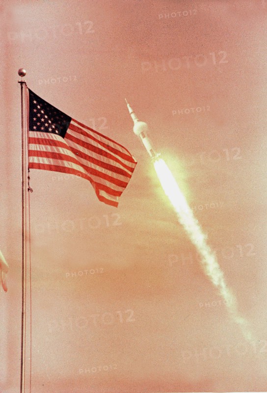 The American Flag  heralds the flight of Apollo XI (July 16, 1969)