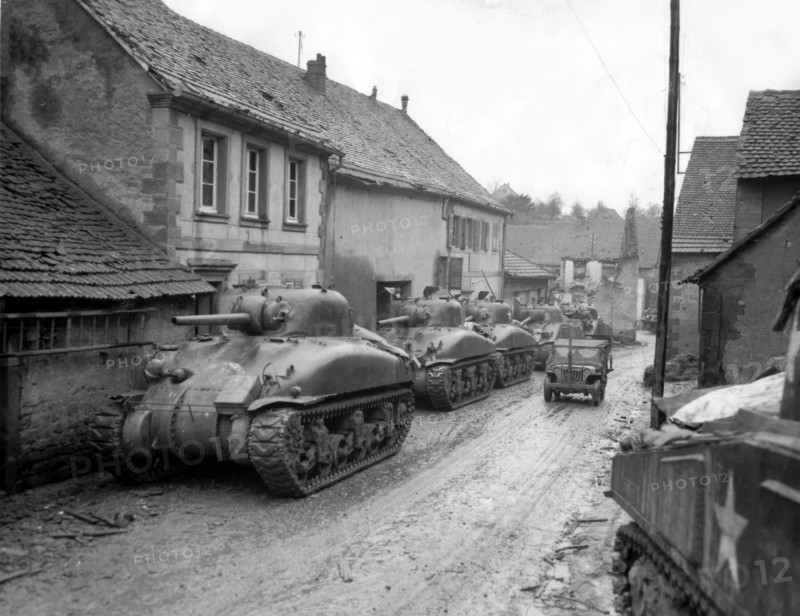 American tanks are grouped on a street in Volksberg (France) 7th Army area, December 6,1944
