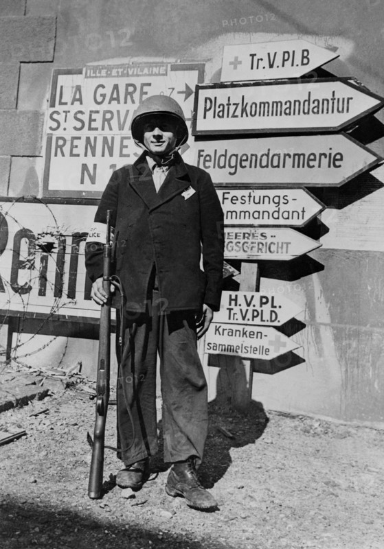 A French policeman on guard in St-Malo, August 1944