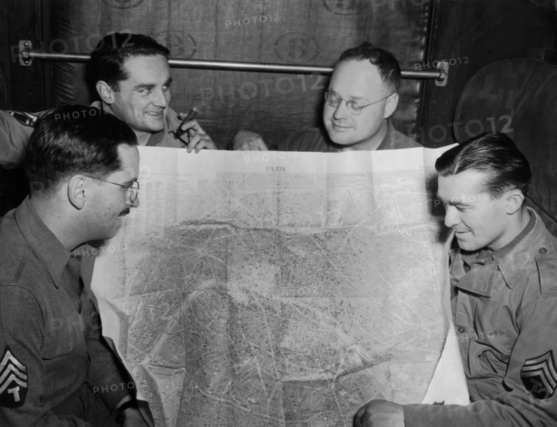 Four G.I's on their way to Paris,  December 7, 1944