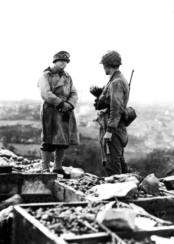 American General views the harbor of Cherbourg, June 27, 1944