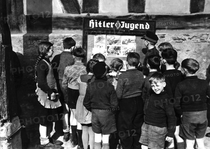 German youth in occupied town, March 23, 1945