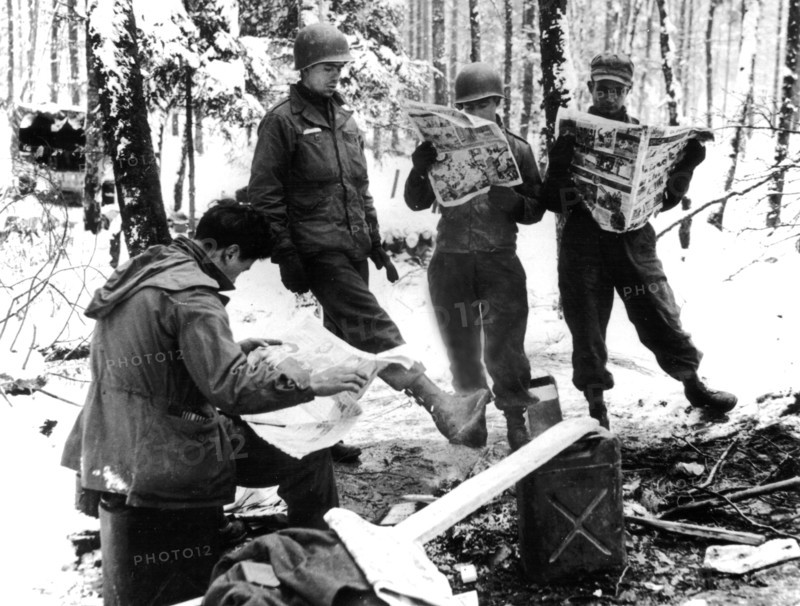 American soldiers enjoy "funny" papers on Western front, Beginning 1945
