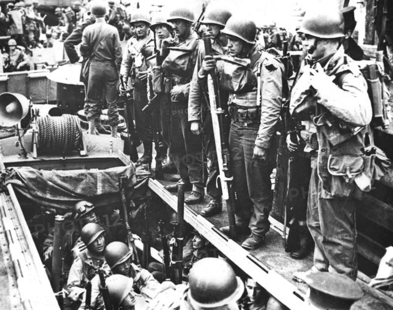 Members of a U.S. Ranger unit before D-Day in an English port (June 1944)