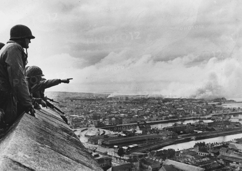 Joseph L. Collins looking at Cherbourg Harbour (June 1944)