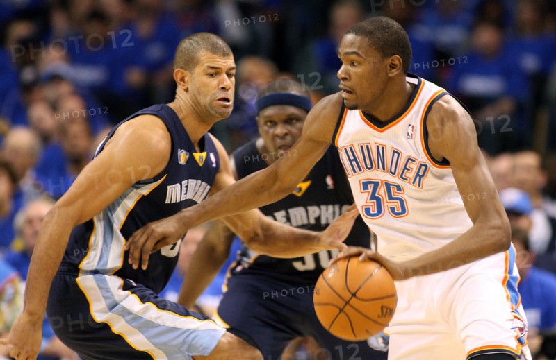 01 May 2011: Thunder forward Kevin Durant (35) goes around Memphis forward Shane Battier (31) during game 1 of the second round of the NBA playoffs where the Oklahoma City Thunder are taking on the Memphis Grizzlies at the Oklahoma City Arena in Oklahoma City, OK.