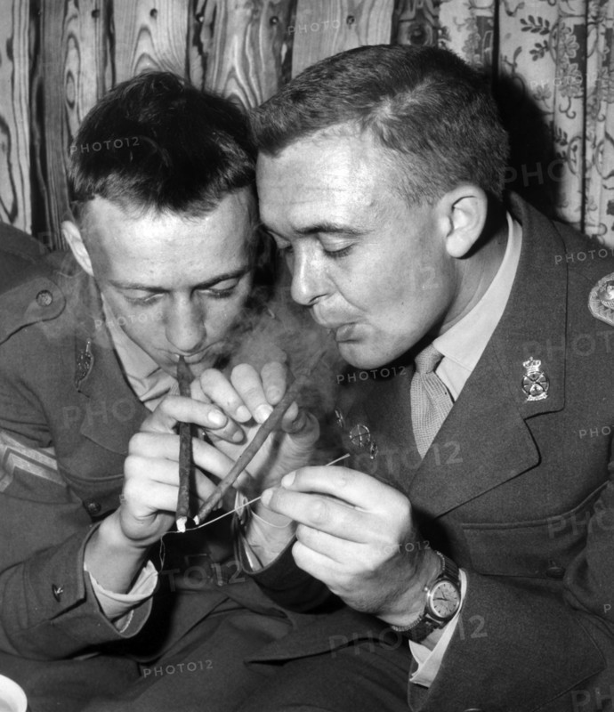 Danish soldiers in Bavaria smoke a Virginia cigar