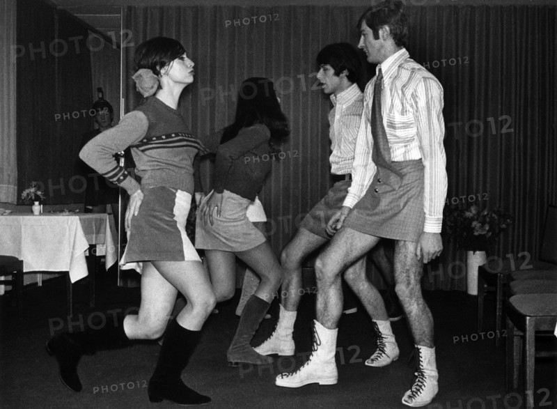 A group of young models, male and female, present themselves in mini skirts on 6 December 1966 in Munich. Following ancient Roman and Scottish models, clever fashion producers tried to make skirts for men popular during the 1960s - with moderate success.