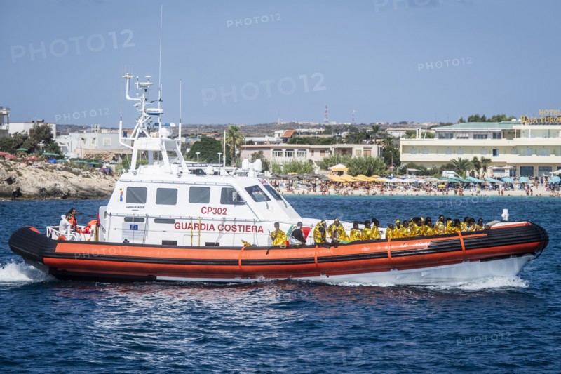 Migrants arriving on Lampedusa Island