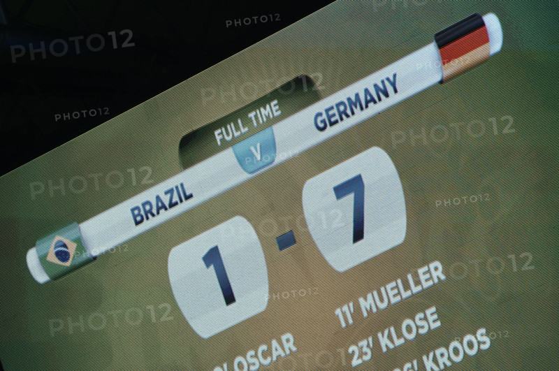 The scoreboard shows the 1-7 final score after the FIFA World Cup 2014 semi-final soccer match between Brazil and Germany at Estadio Mineirao in Belo Horizonte, Brazil, 08 July 2014. Photo: Andreas Gebert/dpa (RESTRICTIONS APPLY: Editorial Use Only, not used in association with any commercial entity - Images must not be used in any form of alert service or push service of any kind including via mobile alert services, downloads to mobile devices or MMS messaging - Images must appear as still images and must not emulate match action video footage - No alteration is made to, and no text or image is superimposed over, any published image which: (a) intentionally obscures or removes a sponsor identification image; or (b) adds or overlays the commercial identification of any third party which is not officially associated with the FIFA World Cup) EDITORIAL USE ONLY