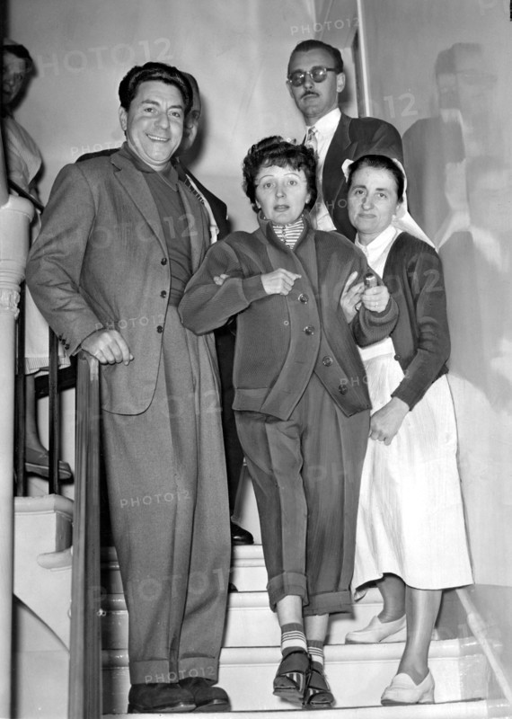 Piaf on Jacques Pills' arm, after she had her appendix removed, September 1954