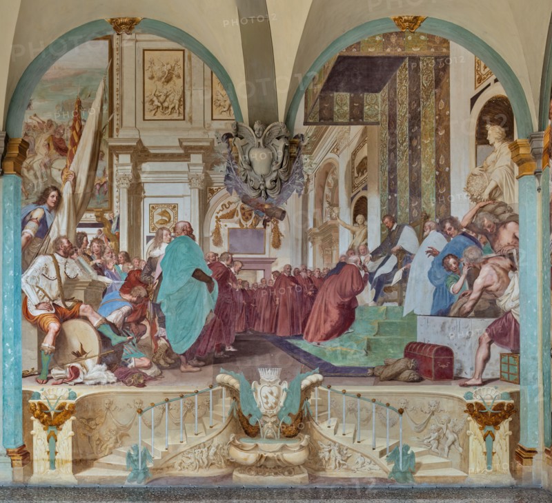 Medici Villa La Petraia, courtyard: “Cosimo I associates his son Francesco with the government”, fresco from the cycle of the Fasti Medicei by Volterrano (Baldassarre Franceschini), 1636-1647.
Set in the Salone dei Cinquecento in Palazzo Vecchio, the scene shows Cosimo I extending the nomination that associates him with the government to his son Francesco on the throne. Francis then receives homage from the Florentine senators, among a varied crowd of onlookers. On the wall you can see the Festina lente tortoise, Cosimo's emblem and, anachronistically, the rhinoceros, which will be the emblem of Cosimo's other son, Ferdinando I. The statues of Peace and Abundance, on the sides of the throne, represent a good omen about the new government, close to court officials pouring bags of coins into a chest. On the left you can see a warrior in the foreground, sitting with a dreamy expression on a broken war drum, because he will no longer have to play it.
Villa medicea La Petraia, Firenze (FI...
