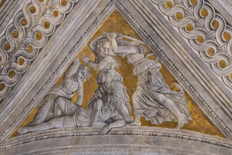 Ducal Palace: vault of the “Bridal Chamber or Camera Picta", which is a room located in the north-east tower of the Castle of San Giorgio in Mantua. It is famous for the cycle of frescoes that covers its walls, a masterpiece by Andrea Mantegna, created between 1465 and 1474.
Detail of the vault: “Death of Orpheus (Orpheus torn apart by the Bacchae”, a pendentive decorated with a fake bas-relief of mythological inspiration, which symbolically celebrates the strength of the marquis as a leader and statesman.
Palazzo Ducale, Mantova (MN) - Mantua, Lombardia - Lombardy, Italia - Italy