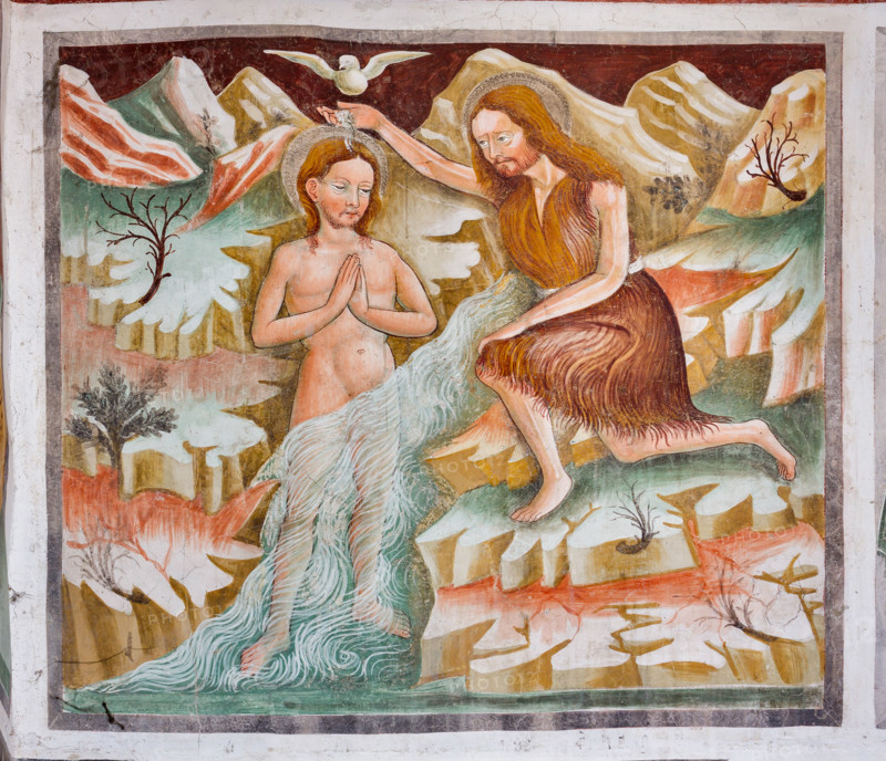 Clusone, Oratory of Disciplini or St. Bernardino, interior, frescoes representing the life of Jesus (1471), by Giacomo Borlone De Buschis: St. John the Baptist baptizes Jesus in the Jordan river. The Holy Spirit descend as a dove.
Clusone (BG), Lombardia - Lombardy, Italia - Italy