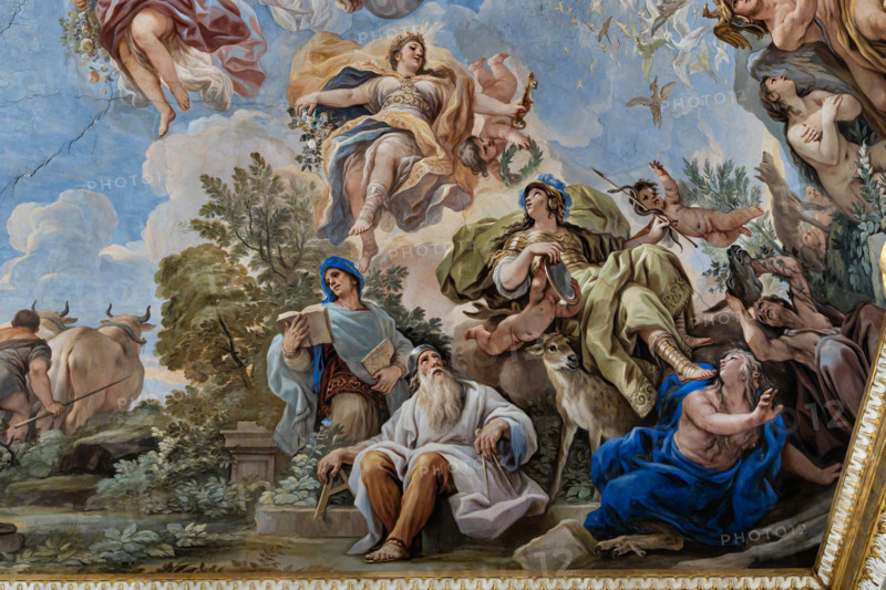 Palazzo Medici Riccardi, Galleria degli specchi (o Sala Luca Giordano): “Allegoria della Prudenza”, particolare della volta. 
Affreschi di Luca Giordano; 1682 - 1685.

La virtù è posta al centro del gruppo con i classici due volti, un elmo dorato in testa, lo specchio e una freccia con un serpente. L'animale abbinato è il cervo (simboleggiante la Prudenza), mentre in alto sono l'Abbondanza, con cornucopia e caduceo, la Grazia, il Benessere, con la coppa e il serpente. In basso sono due saggi dell'antichità con libri e strumenti. 

[ENG]
Medici Riccardi Palace, Gallery of Mirrors (or Room Luca Giordano): “The Allegory of Prudence”, detail of the vault.
Frescoes by Luca Giordano, 1682 - 1685.

Virtue is placed at the centre of the group with the classic two faces, a golden helmet on her head, the mirror and an arrow with a snake. The combined animal is the deer (symbolizing Prudence), while at the top are Abundance, with cornucopia and caduceus, Grace, Well-being, with the cup a...