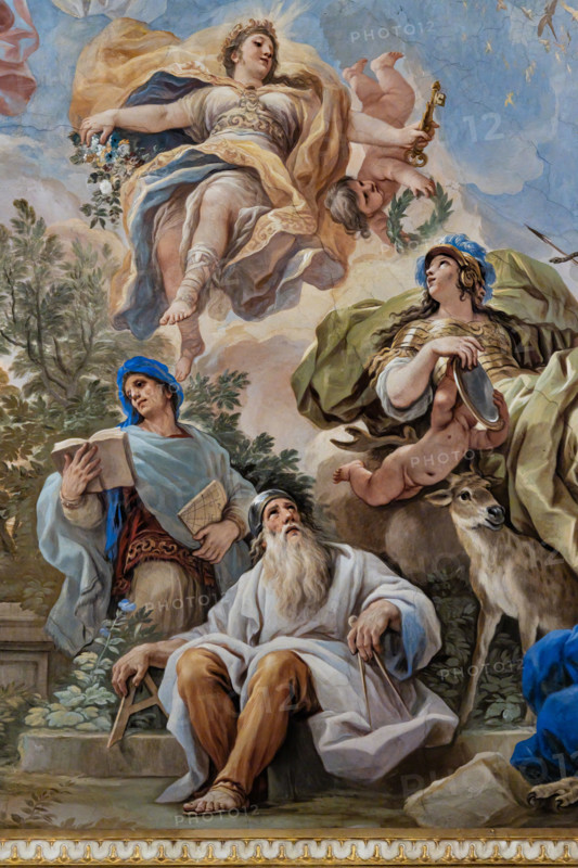 Palazzo Medici Riccardi, Galleria degli specchi (o Sala Luca Giordano): “Allegoria della Prudenza”, particolare della volta. 
Affreschi di Luca Giordano; 1682 - 1685.

La virtù è posta al centro del gruppo con i classici due volti, un elmo dorato in testa, lo specchio e una freccia con un serpente. L'animale abbinato è il cervo (simboleggiante la Prudenza). In basso sono due saggi dell'antichità con libri e strumenti. 

[ENG]
Medici Riccardi Palace, Gallery of Mirrors (or Room Luca Giordano): “The Allegory of Prudence”, detail of the vault.
Frescoes by Luca Giordano, 1682 - 1685.

Virtue is placed at the centre of the group with the classic two faces, a golden helmet on her head, the mirror and an arrow with a snake. The combined animal is the deer (symbolizing Prudence). Below are two sages of antiquity with books and tools.
Palazzo Medici Riccardi, Firenze (FI) - Florence, Toscana - Tuscany, Italia - Italy