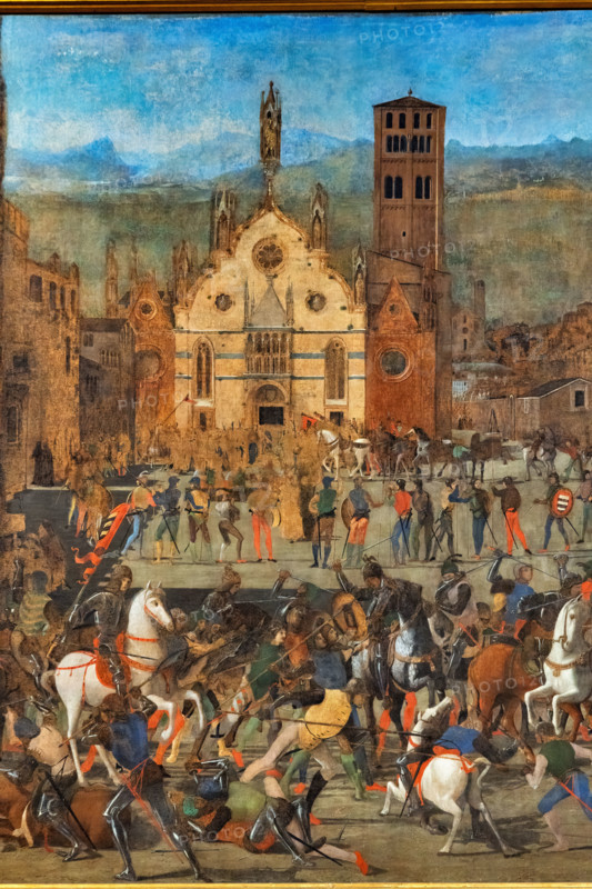 “La cacciata dei Bonacolsi”, di Domenico Morone, tempera grassa su tela, 1494.

Il quadro fu commissionato a Domenico Morone dal quarto marchese di Mantova, Francesco II Gonzaga illustra la vittoriosa battaglia che, il 16 agosto 1328, Luigi I Gonzaga ingaggiò a Mantova contro Rinaldo Bonacolsi per il possesso della città. 
Nell'opera è rappresentato sia l'infuriare della battaglia nella principale piazza cittadina (oggi piazza Sordello), come raccontata dai vecchi cronisti, sia l'architettura della città così come appariva nel momento in cui il Morone la ritrasse, con le sue torri, i palazzi e  la piazza. In fondo, al centro, la cattedrale di Mantova, appare rappresentata con la facciata tardogotica dell'architetto veneziano Jacobello dalle Masegne, ornata con le sculture del fratello Pierpaolo e di Giacomino da Pavia.

[ENG]
“The Expulsion of the Bonacolsi”, by Domenico Moroni, egg tempera on canvas, 1494.

The painting was commissioned to Domenico Morone by the fourth Marquis...