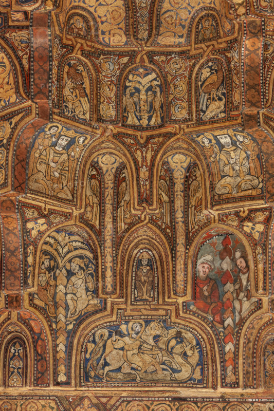 Palermo, Palazzo Reale o Palazzo dei Normanni,  Cappella Palatina (Basilica), navata centrale:  soffitto ligneo, realizzato da maestri di scuola fatimide e costituito da cassoni lignei a muqarnas, dipinte con immagini rare (ornamenti fitoformi e zoomorfi, uccelli, animali fantastici e mitologici, tra cui figure umane in scene di caccia, di guerra e d'amore, suonatori, danzatori e danzatrici del ventre, giocatori di scacchi. Figurazioni generalmente vietate dalla tradizione musulmana) e iscrizioni cufiche (1143). 
Particolare.

[ENG]
Palermo, The Royal Palace or Palazzo dei Normanni (Palace of the Normans), The Palatine Chapel (Basilica), central nave: wooden ceiling, created by Fatimid school masters and consisting of wooden coffers called muqarnas, painted with rare images (phytoform and zoomorphic ornaments, birds, fantastic and mythological animals, including human figures in hunting, making war and  love, players, dancers and belly dancers, chess players: These figures are gene...