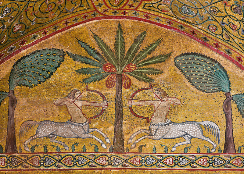 Palermo, The Royal Palace or Palazzo dei Normanni (Palace of the Normans), Pisana Tower, the King Roger Room: view of the Room which was commissioned by King Roger II d'Altavilla. It is characterized by large mosaic surfaces of great value representing plant elements and scenes of courtly and hunting style, symbols of the Norman power (hunting scenes with archers and deer, peacocks, swans, and mythological centaurs, griffins and other exotic animals among luxuriant vegetation). Mosaics are characterised by Greek Byzantine style (XIII century).
Detail with centaurs and palm and banana trees.
Palazzo Reale (Palazzo dei Norma, Palermo (PA), Sicilia - Sicily, Italia - Italy